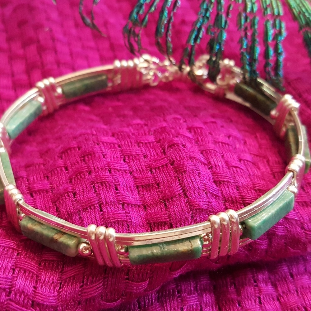 Silver bangle bracelet with green stones NWOT